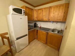 Η κουζίνα ή μικρή κουζίνα στο Duplex 8 pers au pied des pistes Valfréjus