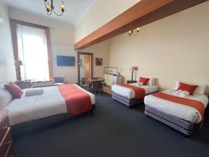 Postel nebo postele na pokoji v ubytování Princes Lodge Motel
