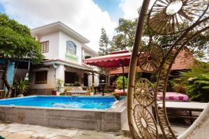 Bazén v ubytování Serendipity Experience Hoi An Hostel nebo v jeho okolí