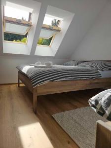 Postel nebo postele na pokoji v ubytování Horský apartmán MIKI