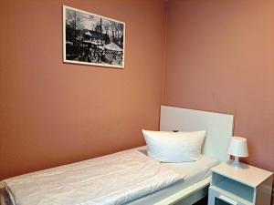 Postel nebo postele na pokoji v ubytování Hotel Altes Badehaus