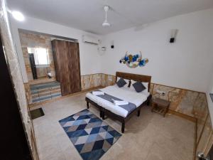 Postel nebo postele na pokoji v ubytování 4 BHK Private Villa Near Calangute