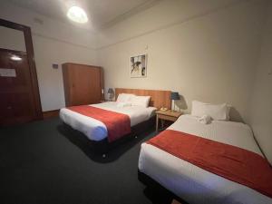 Postel nebo postele na pokoji v ubytování Princes Lodge Motel