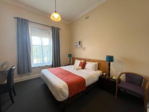 Postel nebo postele na pokoji v ubytování Princes Lodge Motel