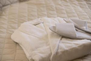 Postel nebo postele na pokoji v ubytování Sockerslottet Hotell