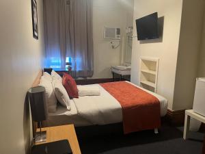 Postel nebo postele na pokoji v ubytování Princes Lodge Motel