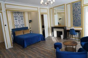 Un ou plusieurs lits dans un hébergement de l'établissement Hotel Montpensier