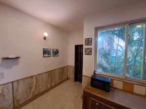 TV a/nebo společenská místnost v ubytování 4 BHK Private Villa Near Calangute