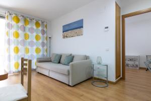 Area soggiorno di FiveStepsToSea - Beach Apartment Valencia