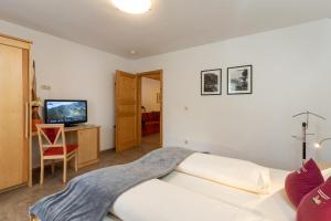 Posteľ alebo postele v izbe v ubytovaní Appartements Am Burgsee