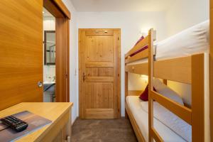 Posteľ alebo postele v izbe v ubytovaní Appartements Am Burgsee