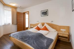 Posteľ alebo postele v izbe v ubytovaní Appartements Am Burgsee