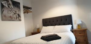 Postel nebo postele na pokoji v ubytování Comfort Stay Sussex 5-bed