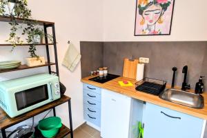 Kuchyň nebo kuchyňský kout v ubytování Uhlpartment - im Herzen von Salzwedel
