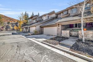 a house on a street with a driveway at Lakeside Adventure in Park City