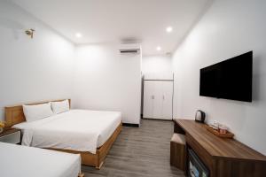 Giường trong phòng chung tại UYÊN GIA HOTEL-PHÚ QUỐC +15 ảnh