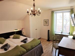 Postel nebo postele na pokoji v ubytování Slite Badhotell