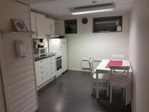 Kuchyň nebo kuchyňský kout v ubytování Wilhelmsen Romutleie
