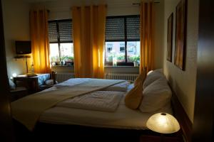 Katil atau katil-katil dalam bilik di Hotel Restaurant Zunftstube