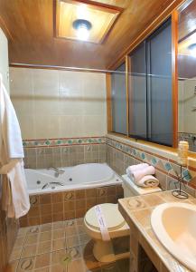 Koupelna v ubytování Hotel El Puma
