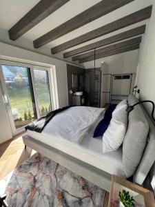 Postel nebo postele na pokoji v ubytování Schladming LOFT