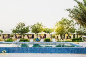 Bazén v ubytování Heritage Juma Resort with swimming pool nebo v jeho okolí