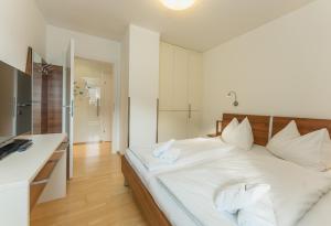 Telewizja i/lub zestaw kina domowego w obiekcie Appartement Lilie by Schladming-Appartements