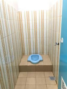Salle de bains dans l'établissement Homestay Lavender C6 Palembang