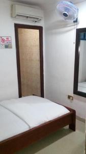 Letto o letti in una camera di BEN AUTO Hotel