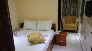 Letto o letti in una camera di BEN AUTO Hotel