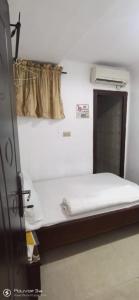 Letto o letti in una camera di BEN AUTO Hotel