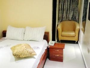 Letto o letti in una camera di BEN AUTO Hotel