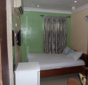 Letto o letti in una camera di BEN AUTO Hotel