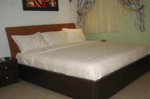 Letto o letti in una camera di BEN AUTO Hotel