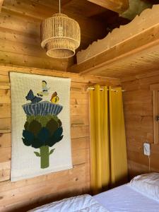 Postel nebo postele na pokoji v ubytování Les Oiseaux Bleus
