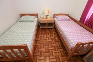 Postel nebo postele na pokoji v ubytování Apartment Sarita