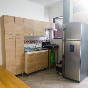 Kuchyň nebo kuchyňský kout v ubytování Cabañas Oasis