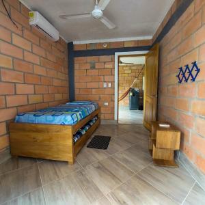 Postel nebo postele na pokoji v ubytování Cabañas Oasis