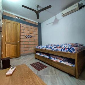 Postel nebo postele na pokoji v ubytování Cabañas Oasis