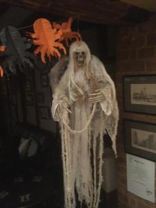 a halloween skeleton is dressed up in white at Samuel Pepys in Harwich