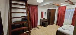 Postel nebo postele na pokoji v ubytování Hotel Bran Stoker