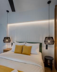 Postel nebo postele na pokoji v ubytování Eudaimonia - Luxury Apartment in Agrinio