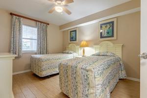 Кровать или кровати в номере The Resort on Cocoa Beach