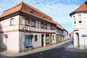 an old building on the side of a street at Maison Harzliesel in Harzgerode