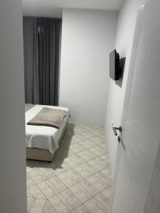 Postel nebo postele na pokoji v ubytování MAGIC M Apartment