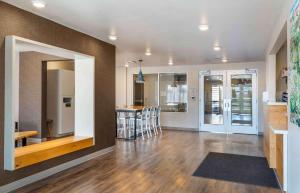 a living room with a kitchen and a dining room at Extended Stay America Suites - Boston - Saugus in Saugus