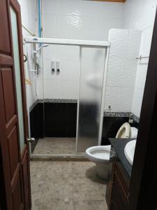 Kylpyhuone majoituspaikassa ShuYa Hotel 舒雅酒店