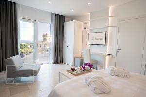 מיטה או מיטות בחדר ב-San Lorenzo Boutique Hotel & SPA