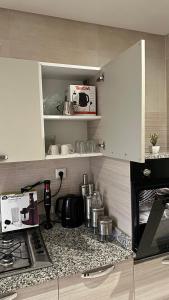 Kuchyň nebo kuchyňský kout v ubytování Luxury Family Appart 7 Pers - CheckPoint - Oujda Center