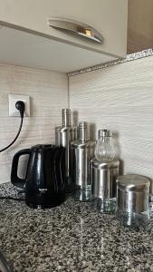 Příslušenství pro přípravu čaje a kávy v ubytování Luxury Family Appart 7 Pers - CheckPoint - Oujda Center